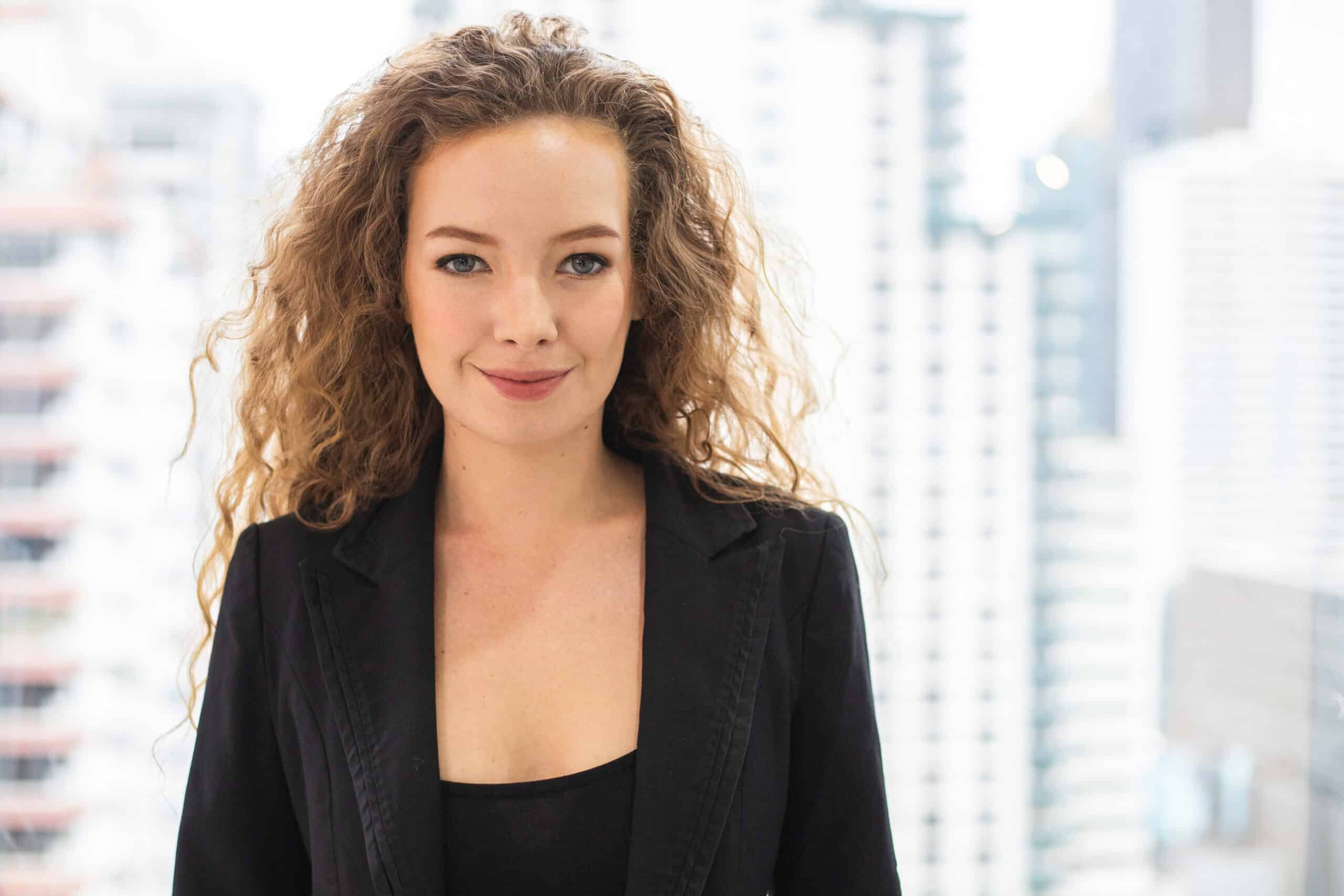 Portrait of Caucasian businesswoman standing in the office